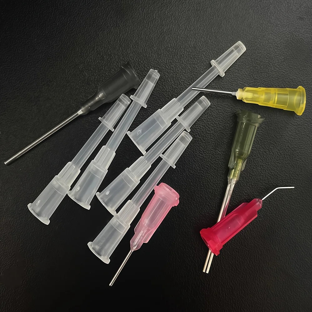 A set of precision laboratory syringes with various accessories, suitable for scientific laboratories to measure liquids.