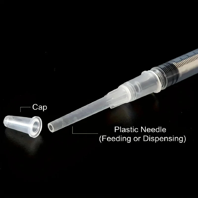 A set of precision laboratory syringes with various accessories, suitable for scientific laboratories to measure liquids.